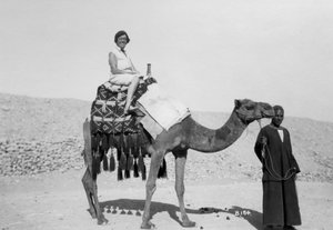 Woman on a camel tour, Egypt, c1920s-c1930s