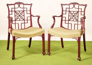 Chippendale mahogany dining chairs in the Chinese taste, top rails surmounted by a ducal coronet and griffon crest, c.1760