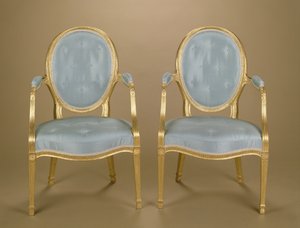 Pair of Adam oval-backed gilt carver chairs, blue upholstered, c.1780