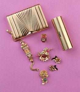Selection of Art Deco jewellery: two cigarette cases; ruby cluster flower brooch and earrings; cocktail watch