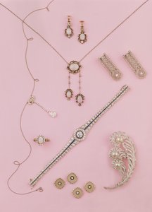 Selection of Edwardian and Art Deco jewellery: opal earrings and pendant; diamond neglige pendant; ostrich plume brooch; diamond and onyx cufflinks and studs