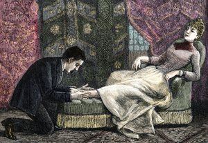 A young woman suffering from a sprain is massaged by her doctor