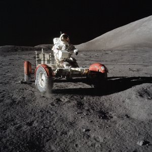 Astronaut Eugene Cernan drives the Lunar Roving Vehicle during first EVA by Unbekannt