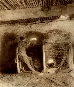 British Sniper lying in wait in a loop-holed stable by Unbekannt
