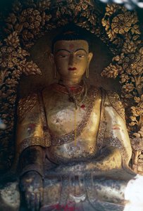 Crypt with statue of Buddha, Swayambhunath (Monkey Temple), Kathmandu Valley (Unesco World Heritage List)