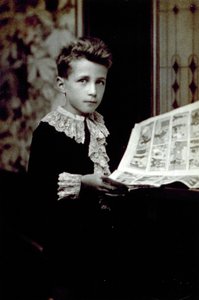 Half-Length Portrait of a Boy Leafing Through a Comic Book