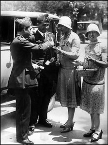 Madrid (Spain) June 1929: The two Spanish pilots Jimenez and Iglesias who return from their journey to South America (They crossed the Atlantic between Seville and Brazil in early April) buy flower vignettes for the benefit of the needy Madrid
