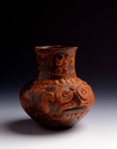 Pre-Columbian art, Maya civilization, initial postclassical period: clay jar representing the god Tlaloc. From Asuncion Mita Jutiapa, Guatemala. Dim. h. 14 x diam. 7.6 cm Guatemala, Museo Nazionale di Archeologia e Etnologia