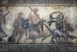 Roman art: the triumph of Dionysus. The god climbed on a tank in the center. It wears a laurel wreath and holds a thyrse. Two panthers are advancing in front of him.