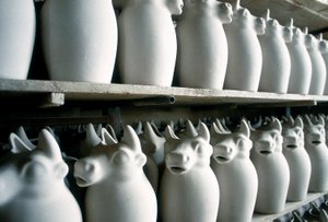 Shelves inside a ceramic factory with some milk jugs, Montelupo Fiorentino, Italy by Unbekannter Künstler