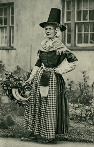 Wales. A stately old Welsh dame, staunch to national costume. 1920