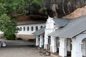 White building underneath a rock wall; cave temple; Golden Temple; Dambulla; Sri Lanka; Asia