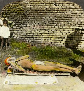 Hindu devotee on a bed of nails near the shrine of Kali, Calcutta, India, early 20th century