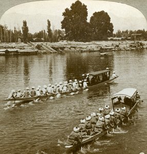 Lady Curzon travelling on the state barge of the Maharaja, Kashmir, India