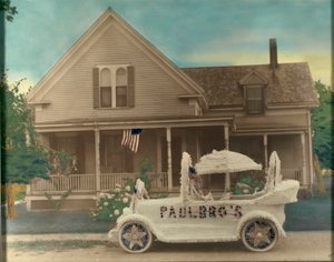 House with Decorated Car in Front by Unidentified
