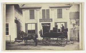 Untitled (S.K. Fisk store with delivery wagon) by Unknown