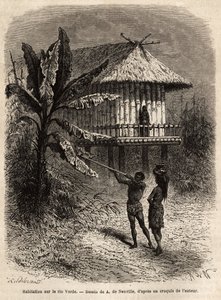 A couple of Indians from Rio Verde (Brazil) the man with his sarbacan, in front of a typical house on stilts. Engraving to illustrate the voyage to New Granada, by Dr. Saffray, in 1869, published in 