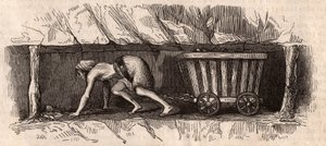 A girl chained to a trolley full of coal and dragging it in an English coal mine