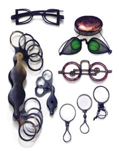 An Assorted Collection of Eyewear and Magnifiers