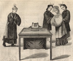 Chinese custom: signing a marriage contract. A tablet with the names of the two spouses is placed on a table with two doves. Engraving in 