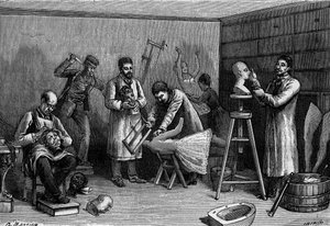 Making wax characters at the Musee Grevin, in Paris. Engraving in 