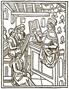 Professor teaching from a chair