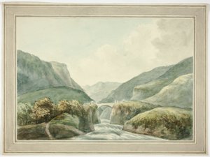 Mountain Town by Bridge Spanning Rapids