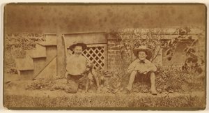 Two Boys Seated on Ground with a Dog by Unknown artist