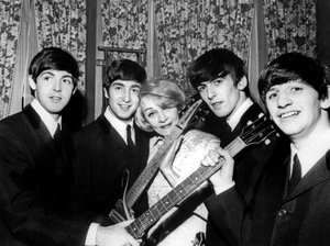 Marlene Dietrich with The Beatles: Paul McCartney, John Lennon, George Harrison, and Ringo Starr, November 1963 by Unknown photographer