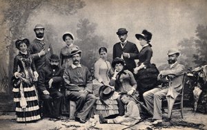 Portrait of a family with a photographer, in front of a country setting. Photography, late 19th century, Paris. Coll. Selva