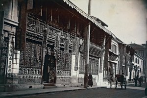 View of buildings along a road in China by Unknown photographer