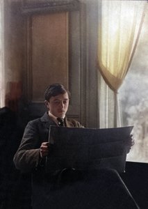 Young Man Reads the Morning Newspaper, France by Unknown photographer