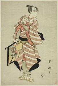 The actor Sawamura Sojuro III as the packhorse-man Muchizo in the play "Miyamairi Musubi no Kamigaki," performed at the Kiri Theater in the eleventh month, 1797