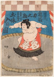 The Wrestler Hidenoyama Raigoro Wearing an Apron