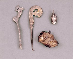 Various pieces of apparatus and Viking jewels, with a representation of the deity Odin. Stockholm, Historiska Museet by Viking Viking