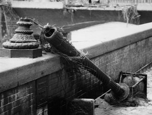 Street lamp broken off by the force of the flood waters in Florence, November 1966 by Vincenzo Balocchi