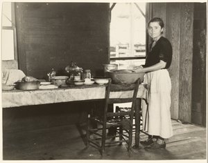 Elizabeth Tengle at the Kitchen Table / Paralee Ricketts Working in the Kitchen