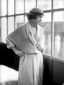 Model wearing a dress created by Anita Pittoni, c.1940