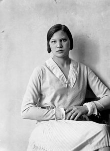 Portrait of Marion Wulz in dress designed by Anita Pittoni, c.1940
