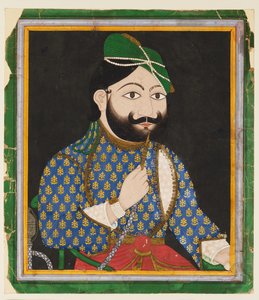 Bearded man wearing a green turban