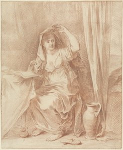 Woman Sitting at a Table Behind a Book