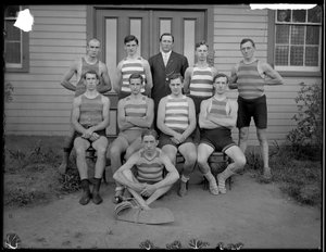Group of unidentified young men posing in swimming costume
