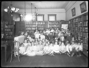 Group Portrait of Children in the Reading Room of an Unidentified Branch of the Queens Borough Public Library by William Davis Hassler