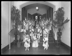 Little Girls at the Roman Catholic Orphan Asylum, Kingsbridge, Bronx, Coming Back from Chapel in White Dresses with Wreathes and Garlands, October 20, 1914 by William Davis Hassler