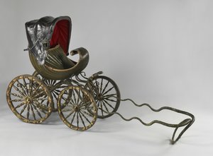 A painted and gilded baby carriage