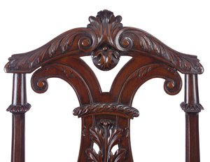 (Detail) of a pair of George II hall chairs, executed by James Moore the Younger by William Kent