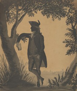 Young Man Leaning Against a Tree With a Book