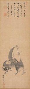 Man Riding Backwards on a Water Buffalo