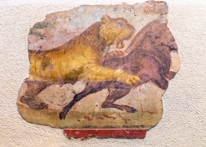 Detail of a Roman mural of a lion attacking a horse by . .