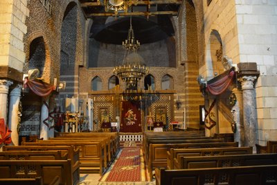 Interior of Saint Mercurius Church Abu Sefein in Old Cairo, historic Coptic Orthodox church with icons and wooden iconostasis by Albert Mansour
